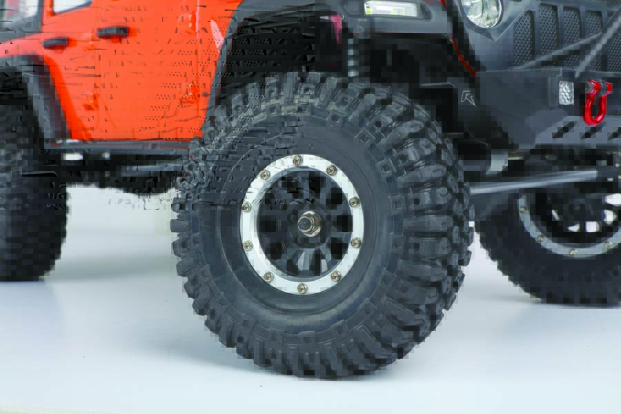 RJ’s 1.9” beadlock wheels are mounted with soft foam rubber inserts and tenacious  all-terrain tires. 