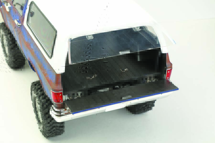 The detailed hard body’s tailgate and rear window can both be opened.