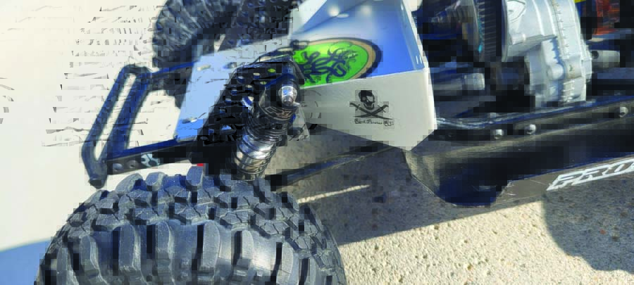 Pro-Line 90mm Big Bore Scaler Shocks ride on Rock Pirates RC rear shock towers.