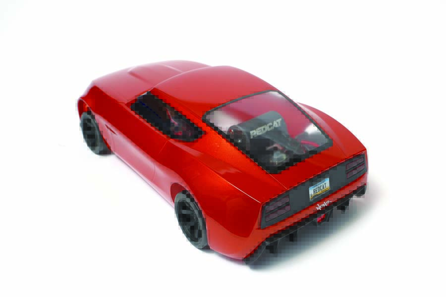 The body includes details such as taillights and a rear diffuser, and it accepts an optional Redcat LED light kit for extra realism.