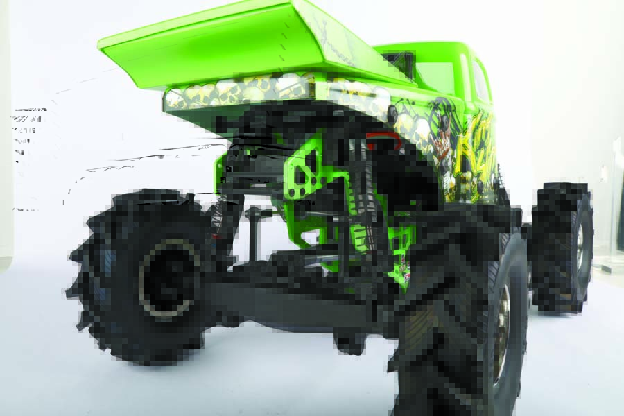 Shields hide the extra-tall shocks from excess mud and debris. A Spektrum S614S servo provides the truck’s steering.