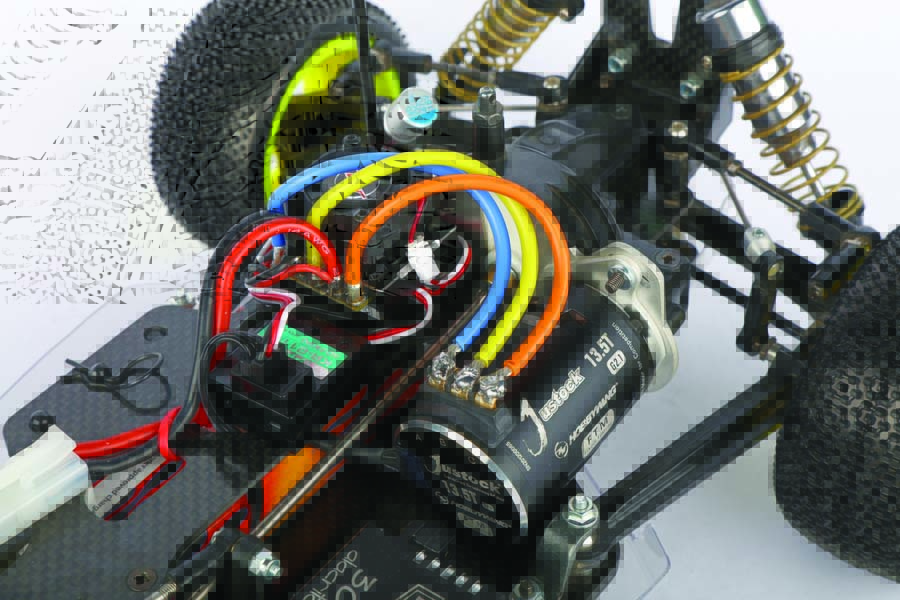 A Hobbywing Xerun Brushless Combo that includes a Justock 13.5T sensored brushless motor and a XR10 Justock brushless ESC brings modern muscle to this retro buggy.
