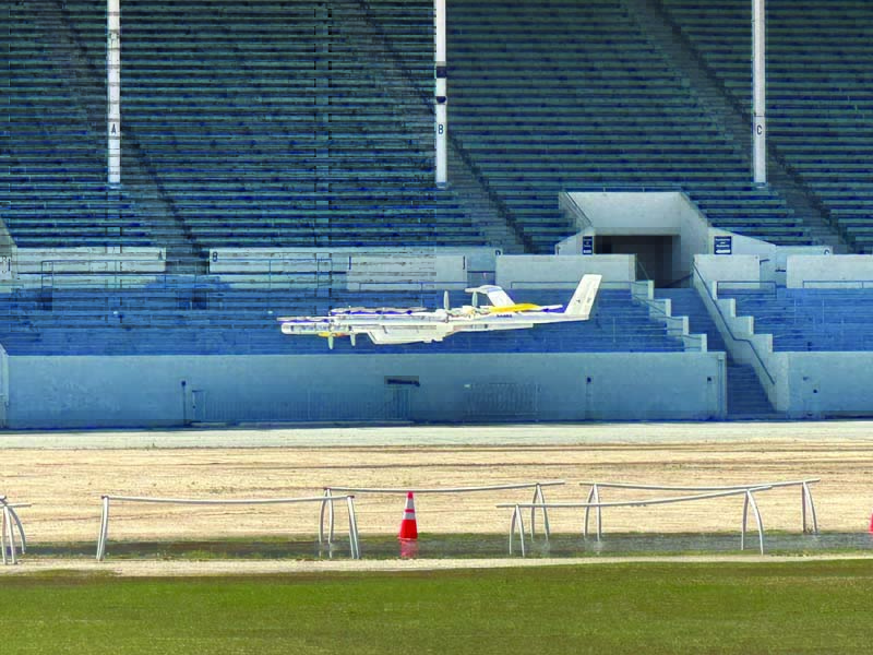 Wing’s delivery drone comes in for a landing after demonstrating how it handles package deliveries.