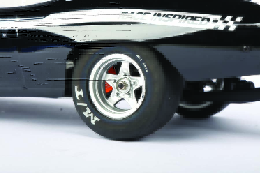 The car comes equipped with a full set of Mickey Thompson drag slicks mounted to aggressive 5-spoke racing wheels.