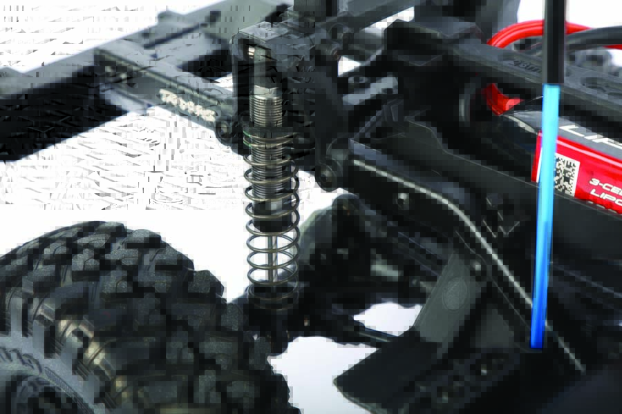 Oil-filled coilover shocks can be adjusted and tuned for optimal crawling performance.