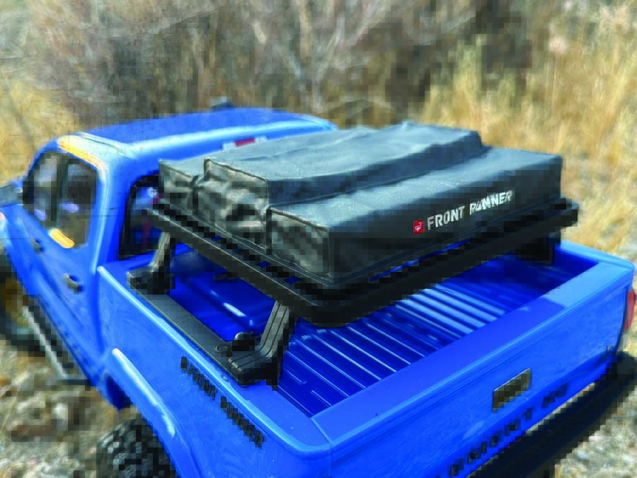 The Knightrunner includes a wealth of scale accessories, many of them officially licensed, like the Front Runner rooftop tent mounted on a Frontrunner bed rack.