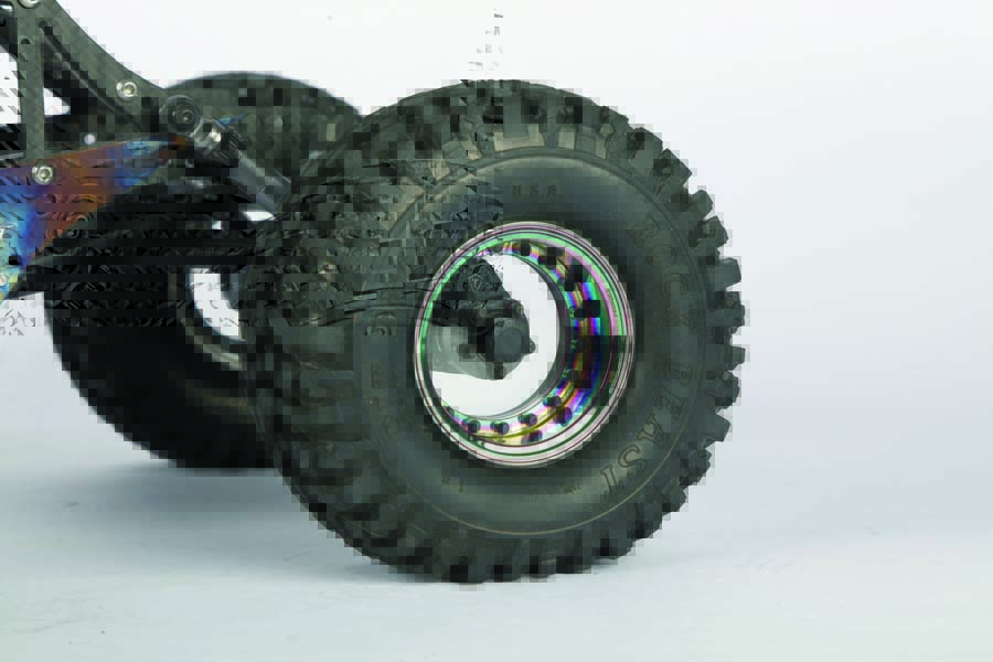 Pit Bull 1.9 tires are wrapped around the eye-catching Boom Racing Clear and Neo Chrome ProBuild 1.9 wheels.